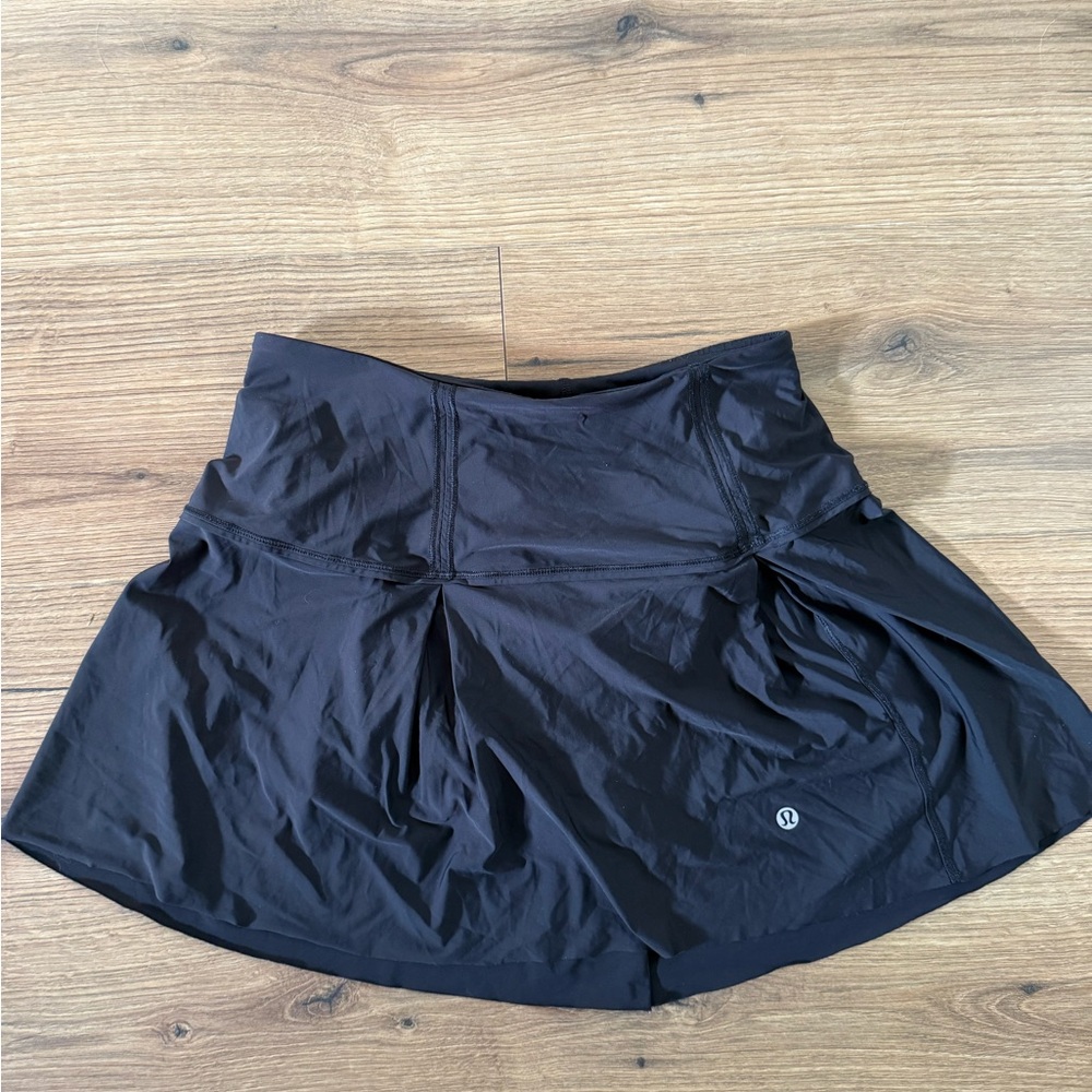 Lululemon black athletic skirt in size 4